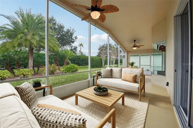 a outdoor space with patio the couches and a dining table with garden view