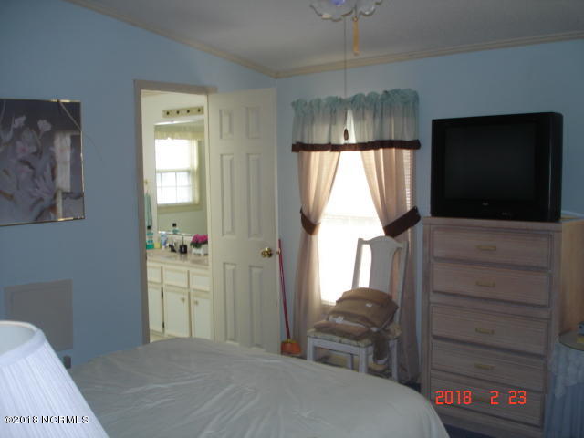 511 Leeward Way Calabash, NC 28467 - Photo 19 of 27 door leading to private deck