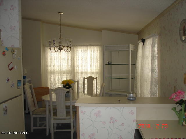 511 Leeward Way Calabash, NC 28467 - Photo 7 of 27 Kitchen looking into dining room