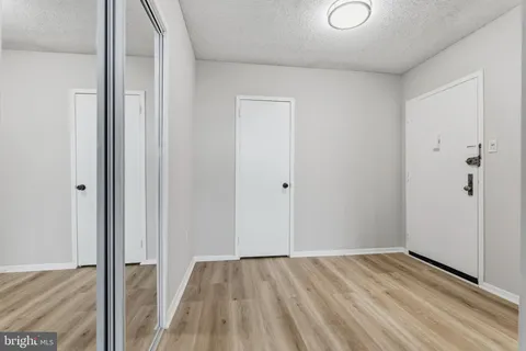 a view of an empty walk in closet