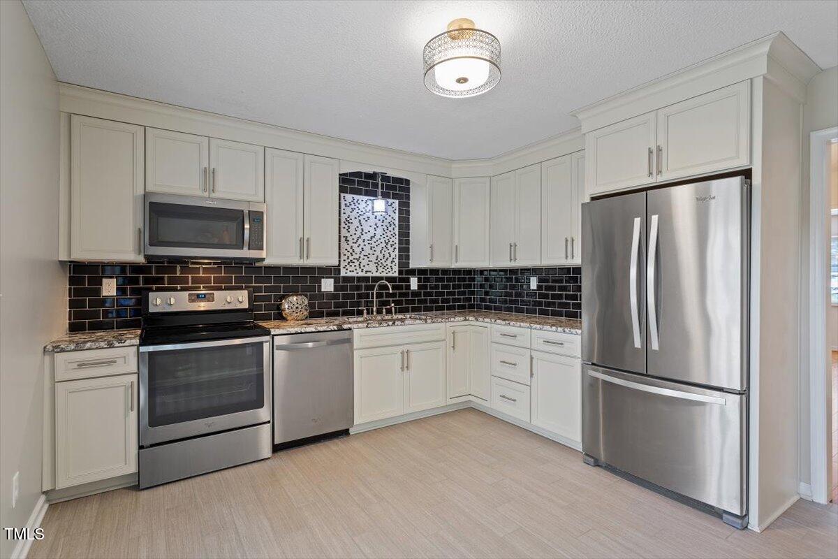 7914 Yester Court Raleigh, NC 27615 - Photo 13 of 29