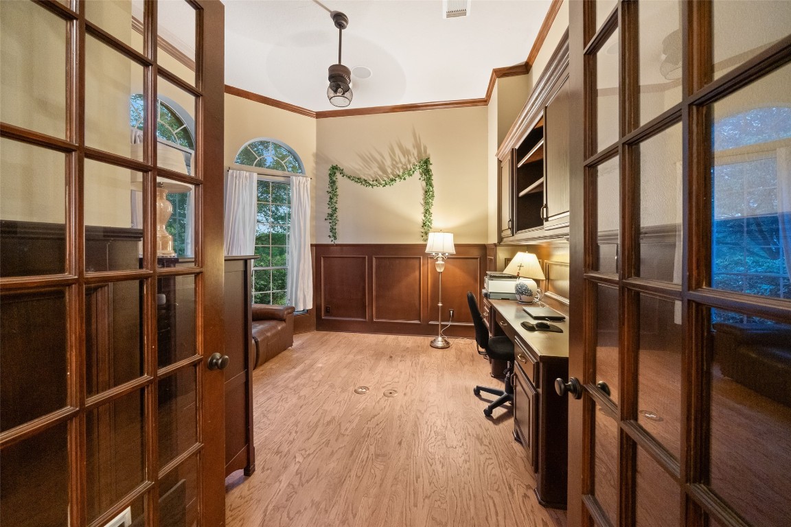 13222 Stonecrest Lane Conroe, TX 77302 - Photo 10 of 44 Great home office space with custom cabinets and natural lighting