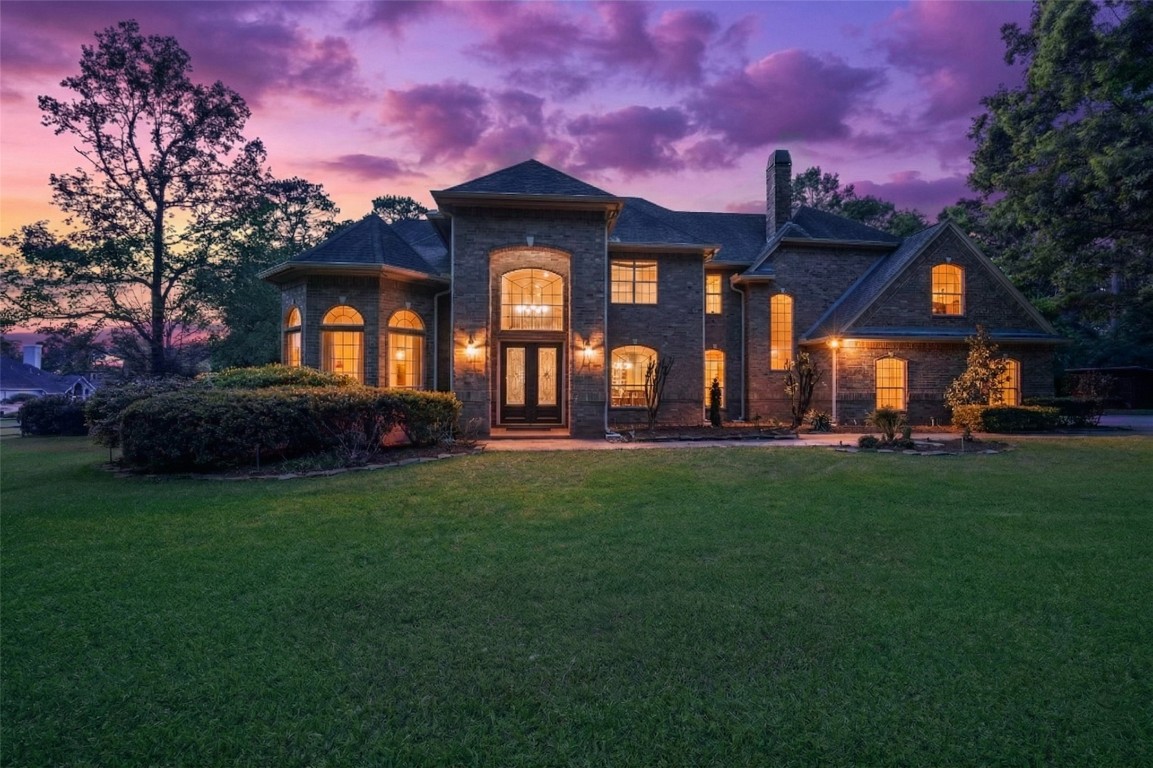 13222 Stonecrest Lane Conroe, TX 77302 - Photo 43 of 44 Dusk view of this gorgeous home.
