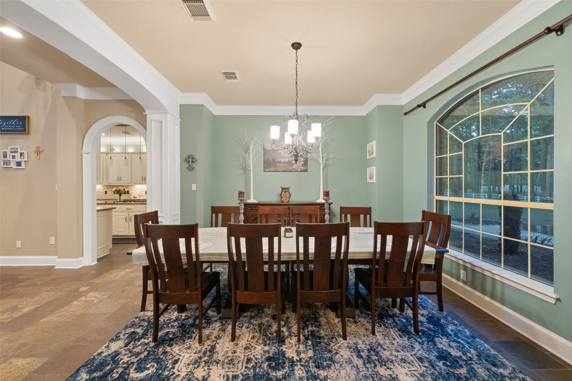 13222 Stonecrest Lane Conroe, TX 77302 - Photo 5 of 44 Formal dining room, notice the triple crown molding