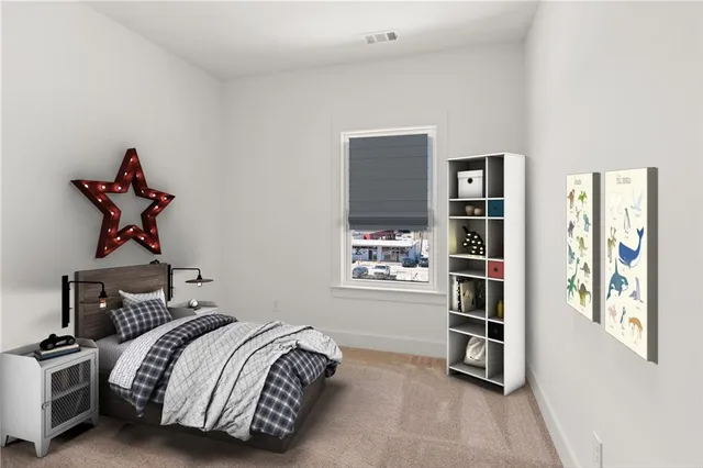 a bedroom with a bed and cabinets