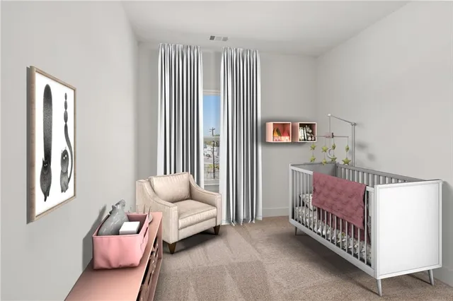 a bedroom with furniture and windows