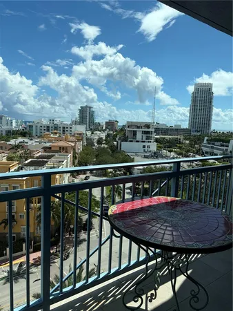 a view of a balcony with wooden floor