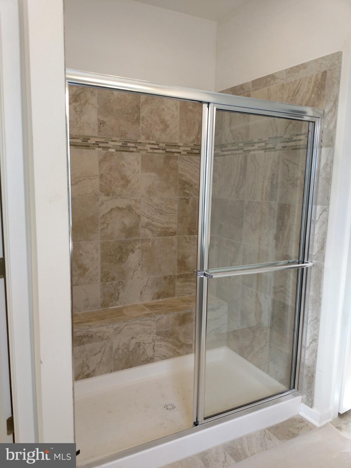 1233 David Road Townsend, DE 19734 - Photo 22 of 71 Shower with seat and upgraded tile