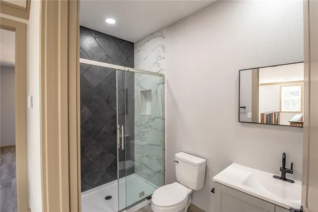 a dining room with kitchen island a table and chairs