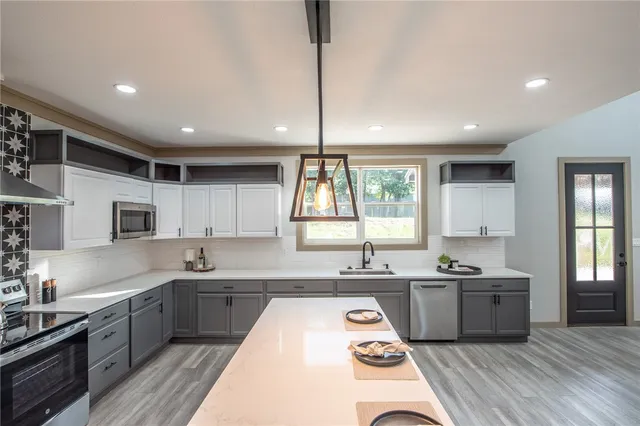 a bedroom with bed and a window