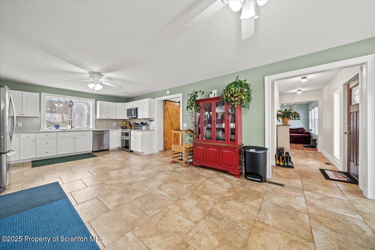 162 Churchill Lake Road Thompson, PA 18465 - Photo 19 of 76 Entry into Kitchen