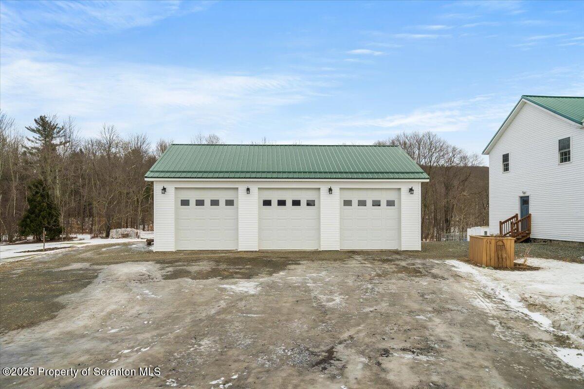 162 Churchill Lake Road Thompson, PA 18465 - Photo 5 of 76 Garage