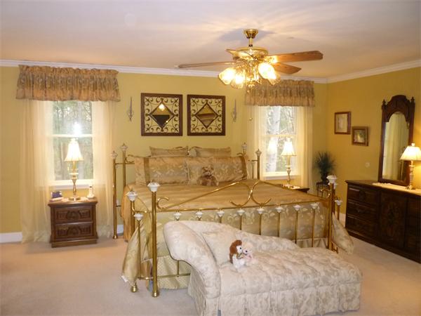 218 Rangeway Road, Unit 271 Billerica, MA 01862 - Photo 15 of 30 a bed room with a bed and a chandelier