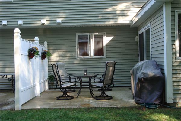 218 Rangeway Road, Unit 271 Billerica, MA 01862 - Photo 3 of 30 a building outdoor space with patio furniture and potted plants