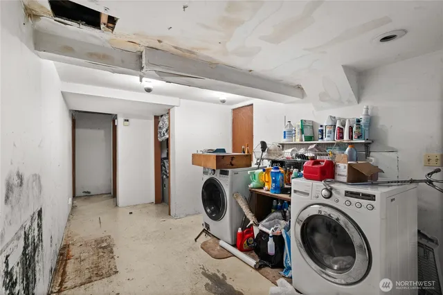 a utility room with dryer and washer