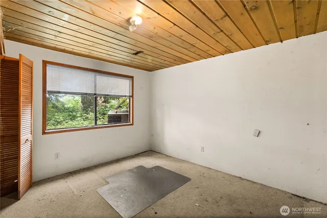 an empty room with windows