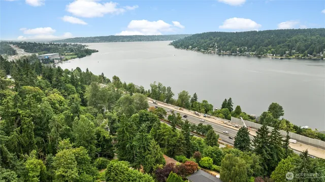 a view of front door with wooden floor