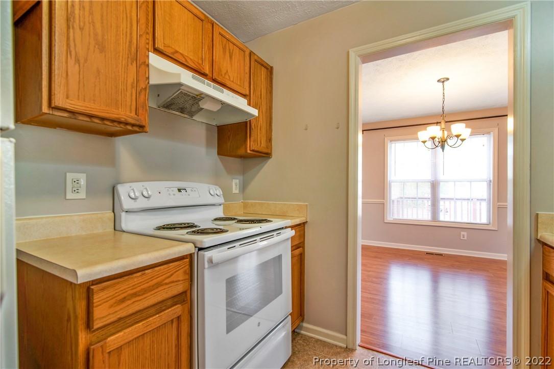 205 Rye Lane Raeford, NC 28376 - Photo 18 of 38 a kitchen with a stove and a sink
