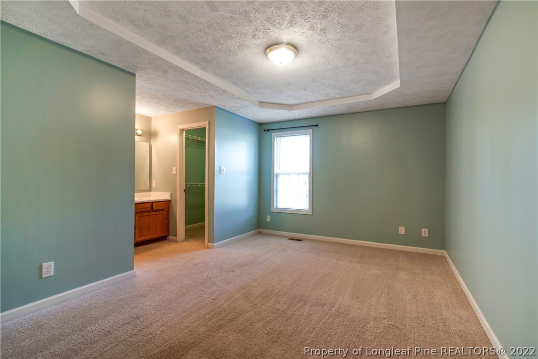 205 Rye Lane Raeford, NC 28376 - Photo 19 of 38 an empty room with windows and closet