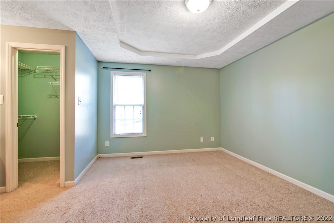 205 Rye Lane Raeford, NC 28376 - Photo 22 of 38 an empty room with windows