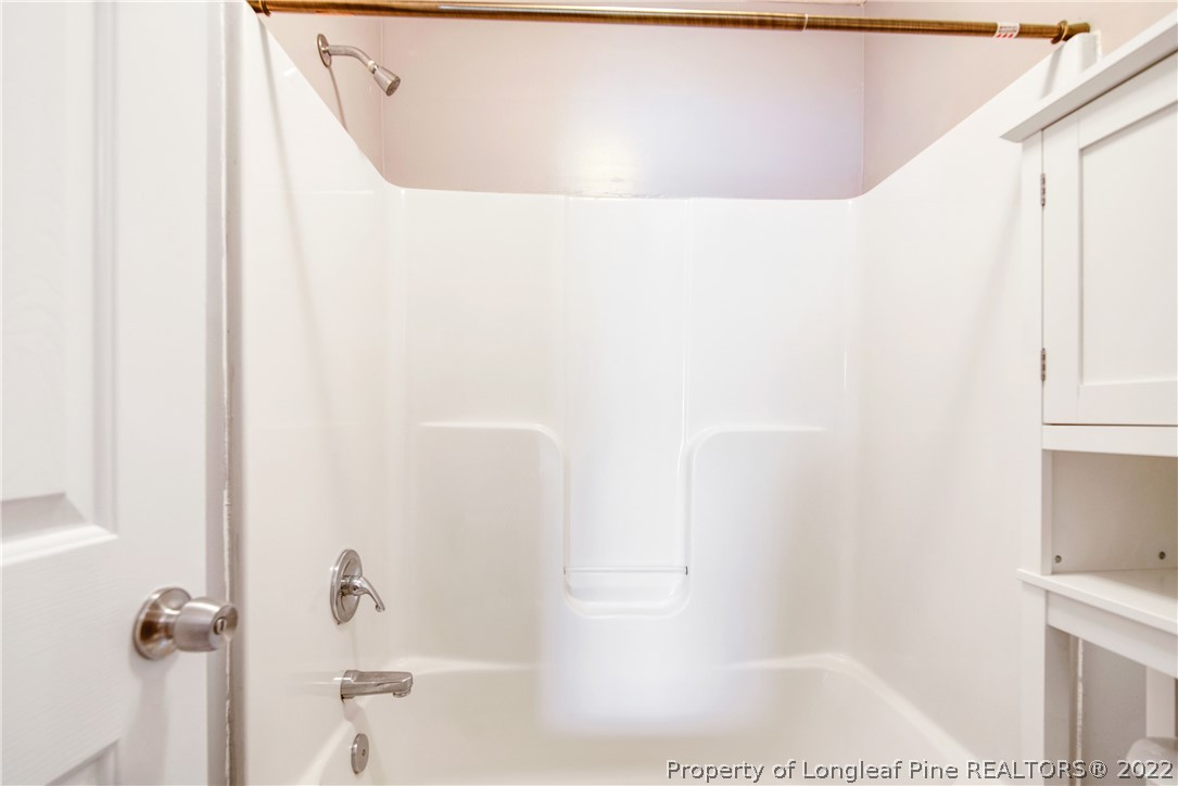 205 Rye Lane Raeford, NC 28376 - Photo 24 of 38 a bathroom with a shower