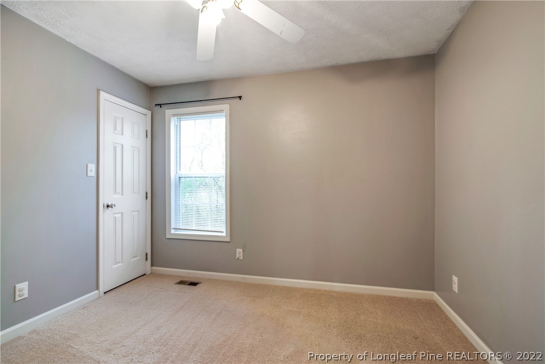 205 Rye Lane Raeford, NC 28376 - Photo 25 of 38 an empty room with windows
