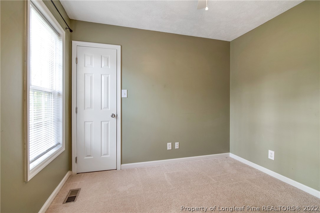 205 Rye Lane Raeford, NC 28376 - Photo 32 of 38 a view of an empty room and window