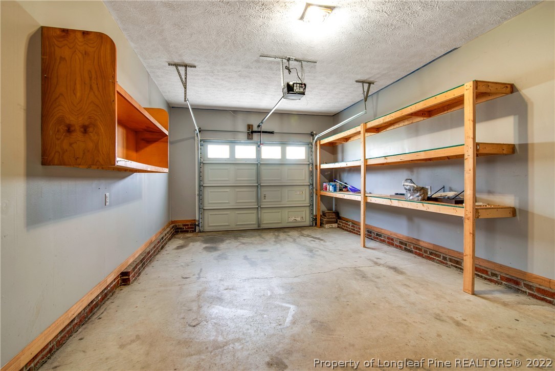 205 Rye Lane Raeford, NC 28376 - Photo 34 of 38 a view of an empty room with storage