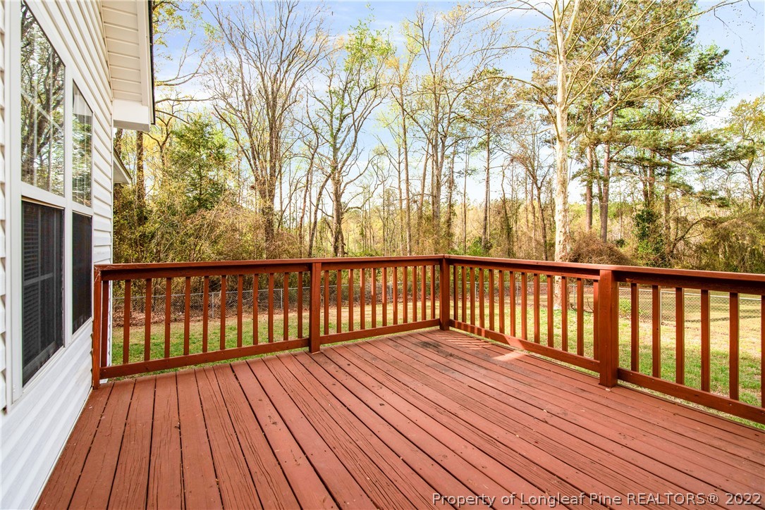 205 Rye Lane Raeford, NC 28376 - Photo 35 of 38 a view of balcony with wooden floor