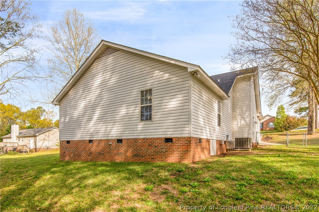 205 Rye Lane Raeford, NC 28376 - Photo 38 of 38 a house view with a garden space