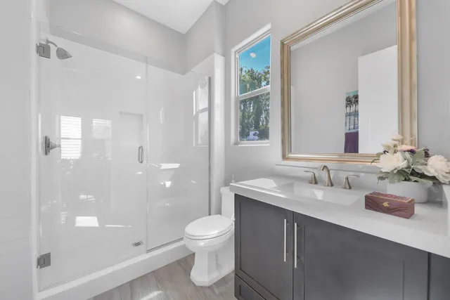 a view of a city with mountains in the background