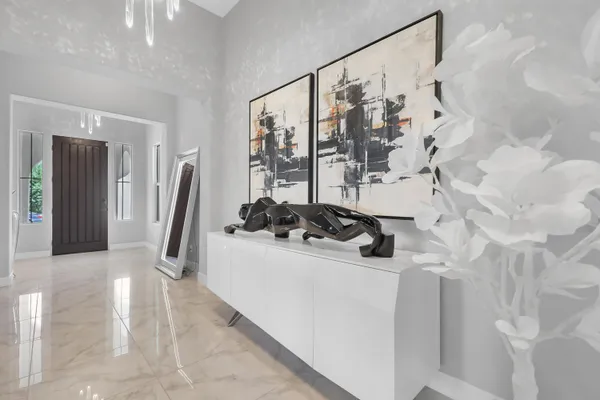 a kitchen with stainless steel appliances kitchen island granite countertop a sink and cabinets