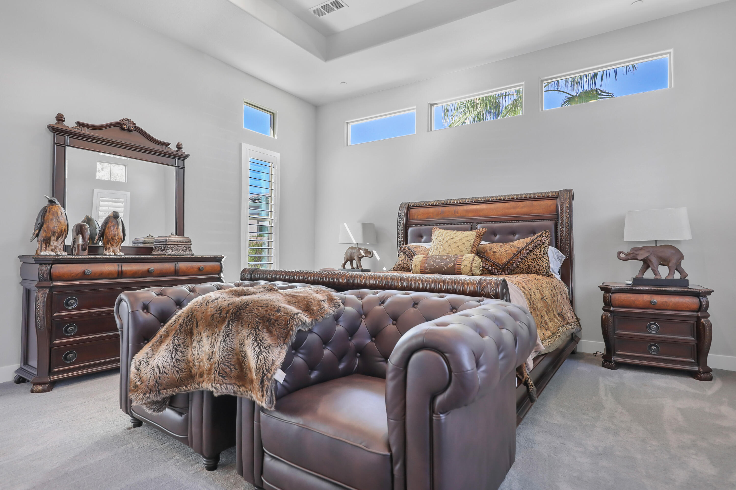 81-695 Thunder Gulch Way La Quinta, CA 92253 - Photo 26 of 51 a bed room with a bed and a dresser