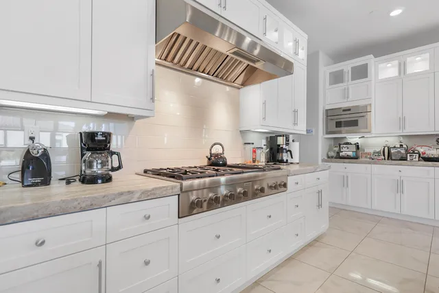 a bed room with a bed and a dresser