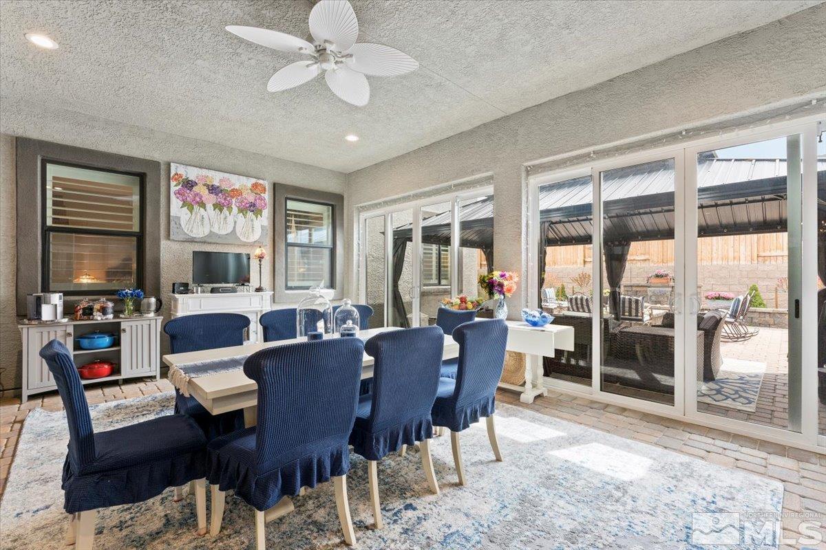 2166 Kate's Bridge Drive Reno, NV 89521 - Photo 12 of 34 a view of a dining room with furniture window and outside view