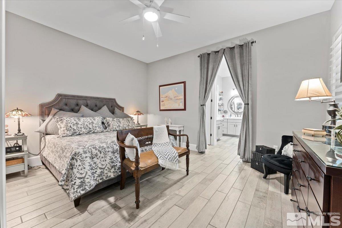 2166 Kate's Bridge Drive Reno, NV 89521 - Photo 8 of 34 a bed room with a bed window and a chair