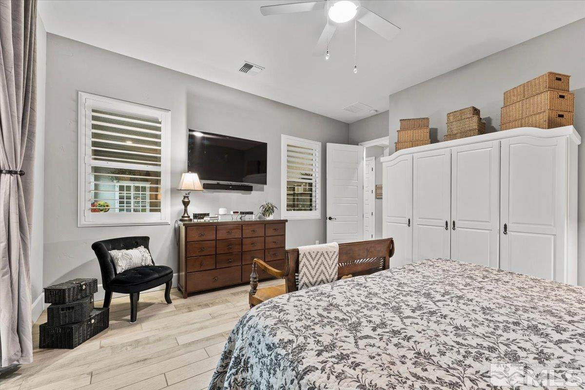 2166 Kate's Bridge Drive Reno, NV 89521 - Photo 10 of 34 a bedroom with a bed and furniture