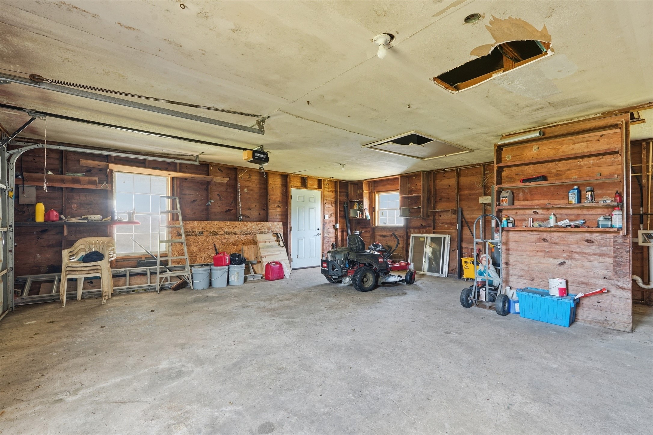212 Jones Road Highlands, TX 77562 - Photo 24 of 24 a view of a garage with parked area