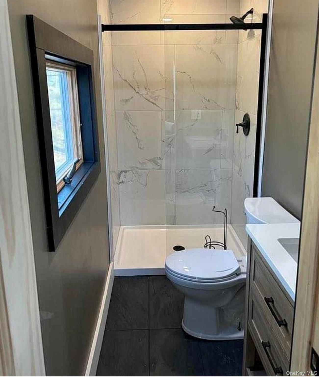 541 Cold Spring Road Monticello, NY 12701 - Photo 30 of 31 a bathroom with a sink and a toilet