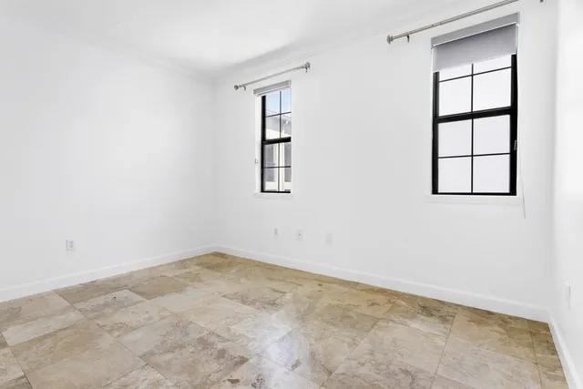 an empty room with windows