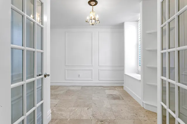 an empty room with windows