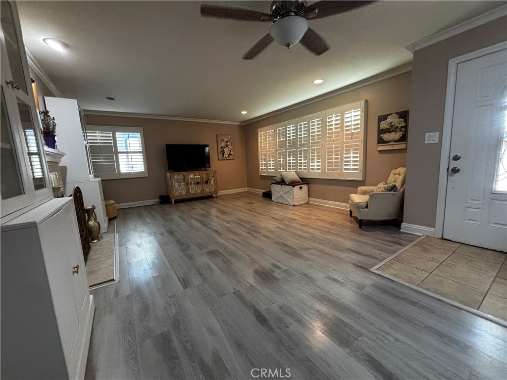 5604 Tower Road Riverside, CA 92506 - Photo 11 of 70 a living room with furniture and a flat screen tv