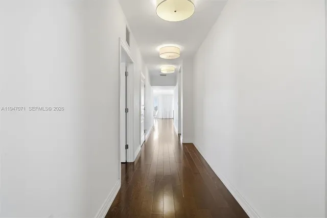 a view of a patio with dining table and chairs
