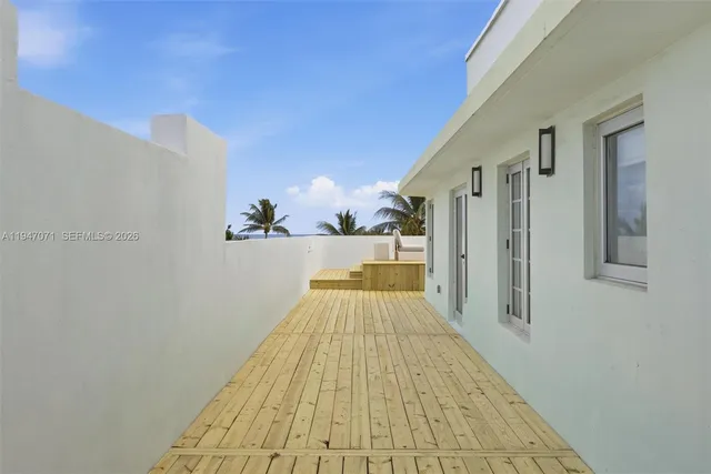 a front view of a bathroom with a shower