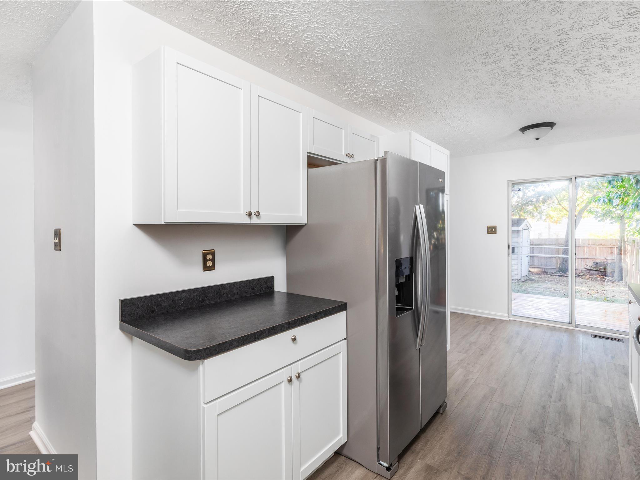 321 Sherando Circle Stephens City, VA 22655 - Photo 16 of 34 a kitchen with stainless steel appliances a refrigerator sink and cabinets