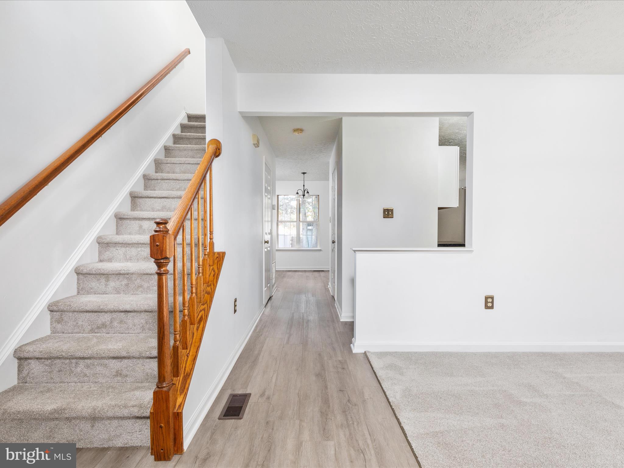 321 Sherando Circle Stephens City, VA 22655 - Photo 19 of 34 a view of a hallway with wooden floor and staircase