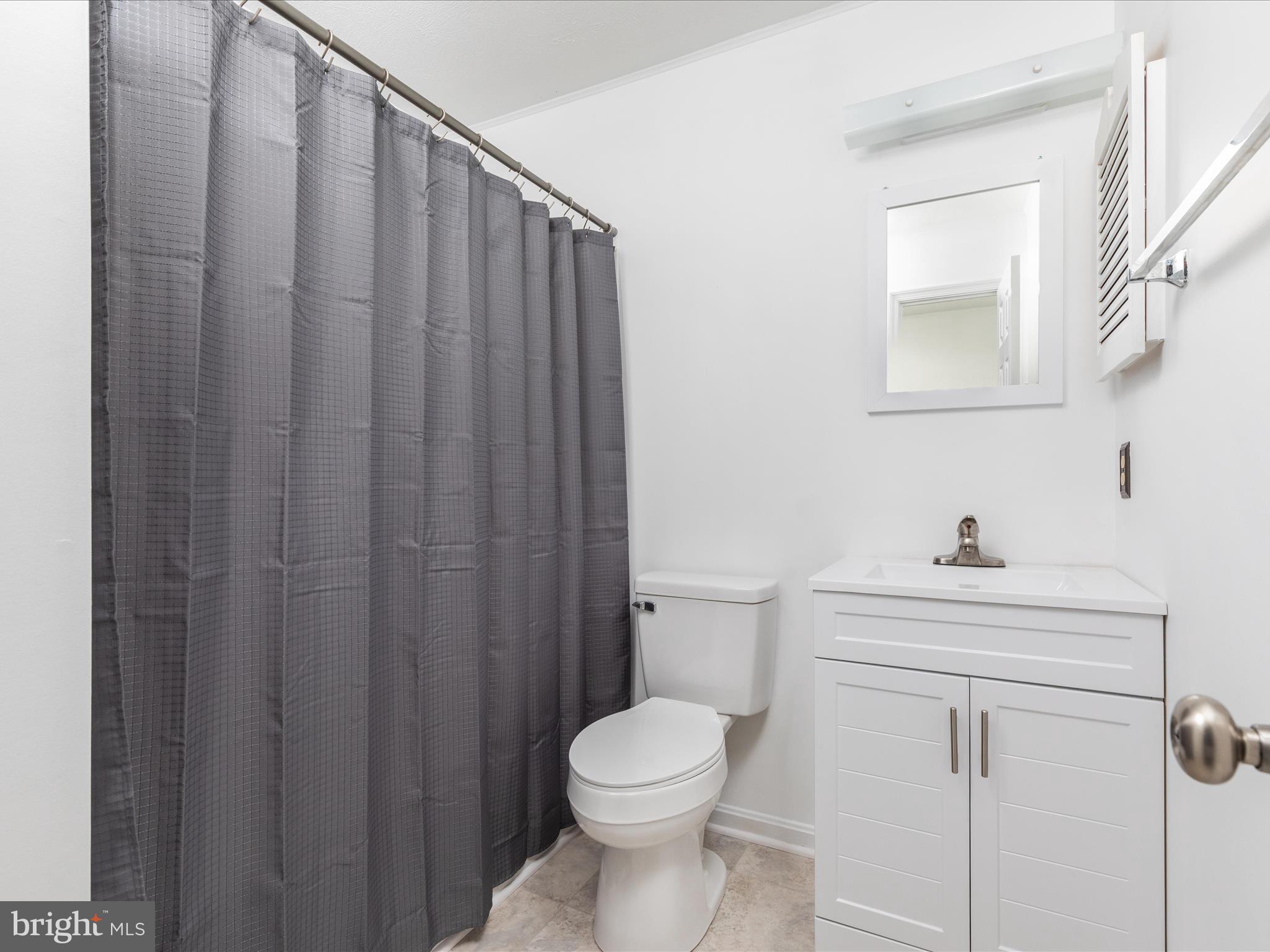 321 Sherando Circle Stephens City, VA 22655 - Photo 24 of 34 a bathroom with a sink a toilet and vanity