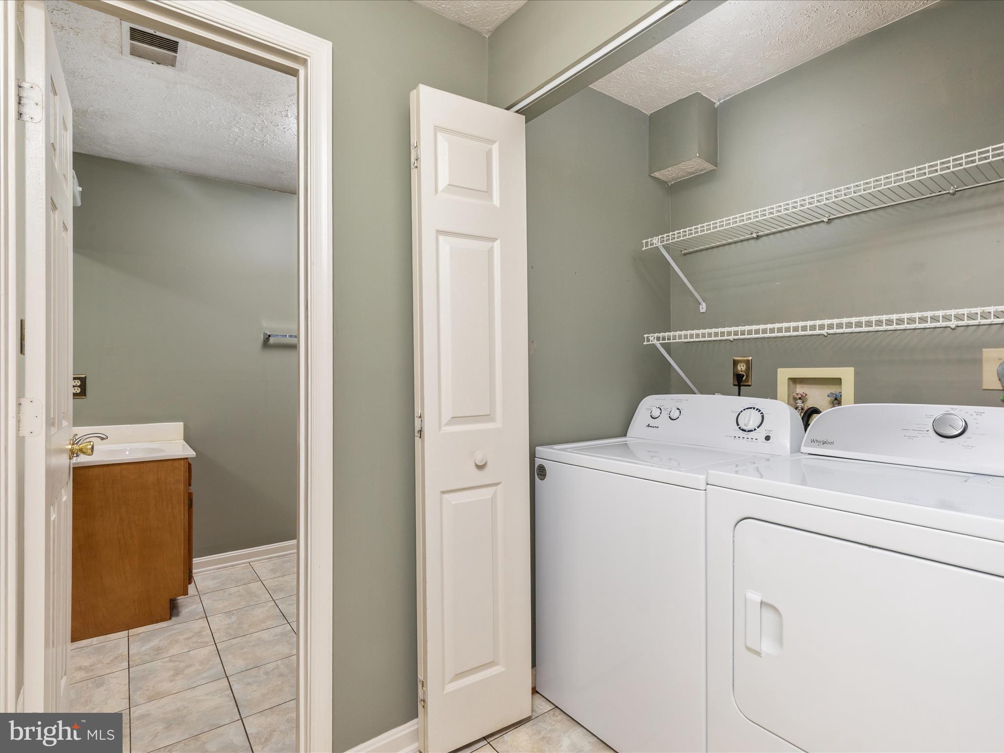 321 Sherando Circle Stephens City, VA 22655 - Photo 4 of 34 a utility room with dryer and washer