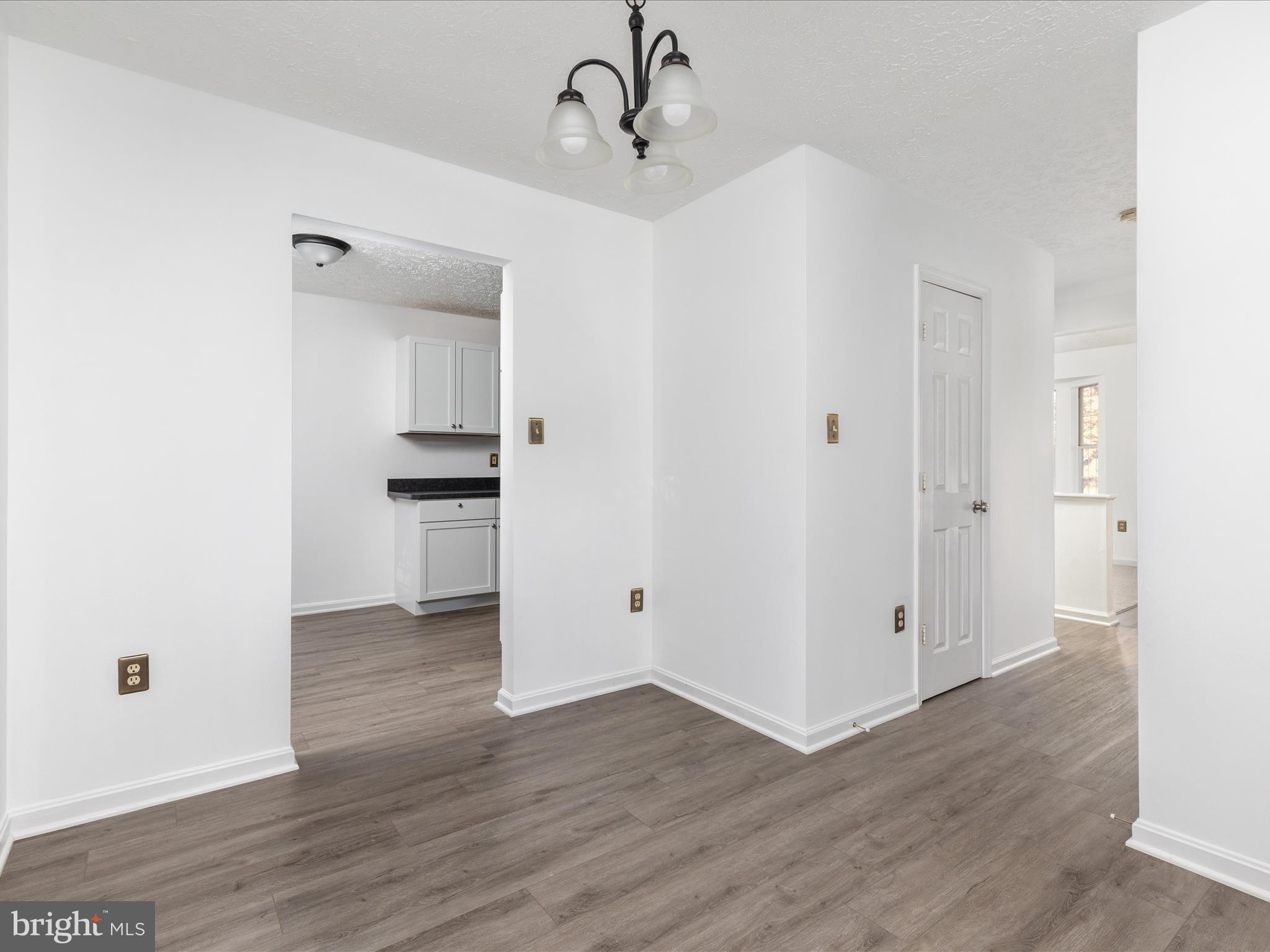 321 Sherando Circle Stephens City, VA 22655 - Photo 9 of 34 a view of a kitchen with wooden floor and electronic appliances