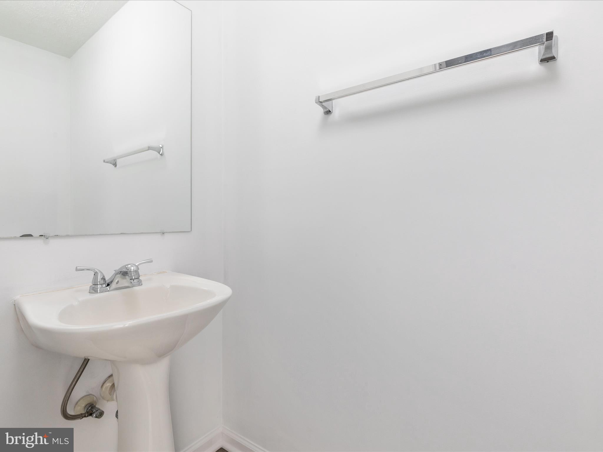 321 Sherando Circle Stephens City, VA 22655 - Photo 10 of 34 a bathroom with a sink a mirror and a shower